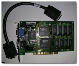 A Diamond 3Dfx Voodoo Graphics card with its VGA bridge cable.